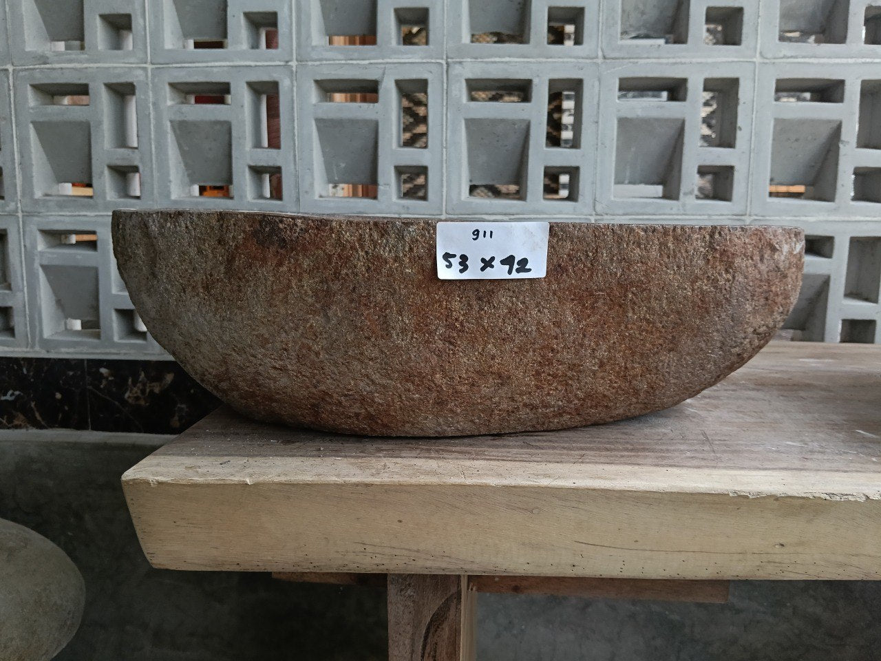 Front view of 6911-5342 river stone basin — polished interior