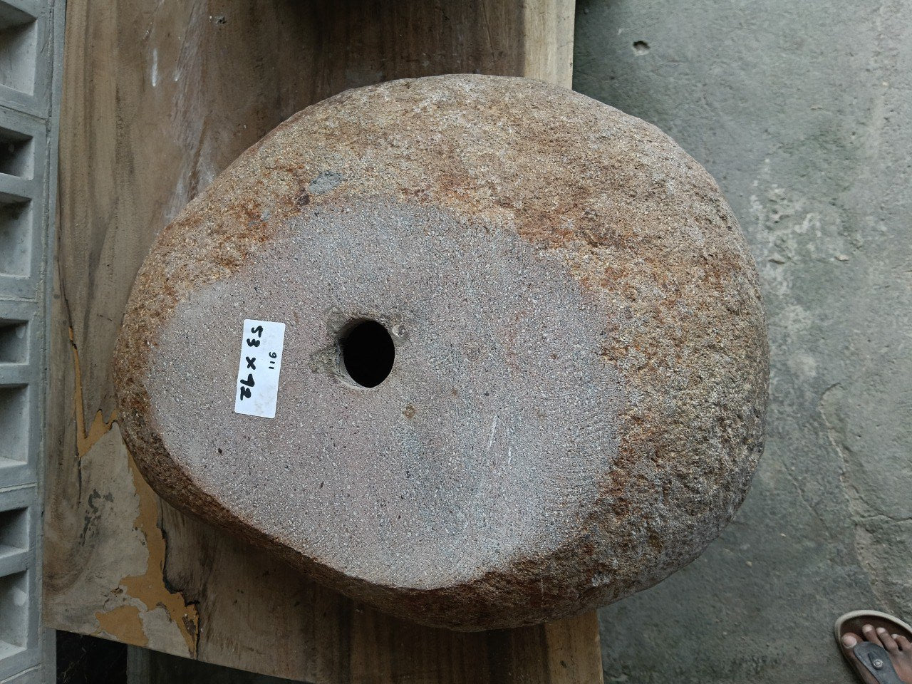 Bottom view of 6911-5342 solid river stone vessel