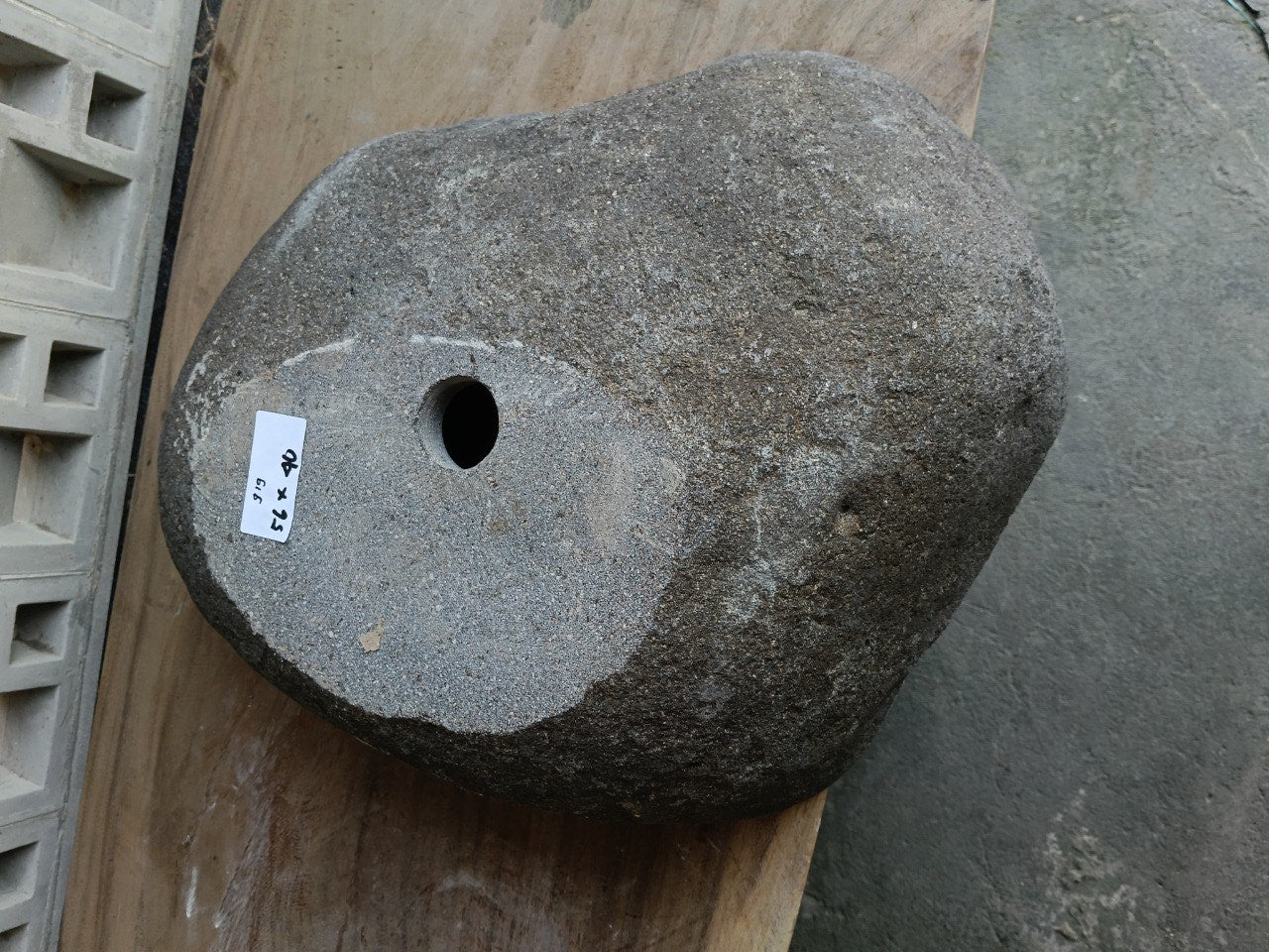 Bottom view of 6919-5640 solid river stone vessel