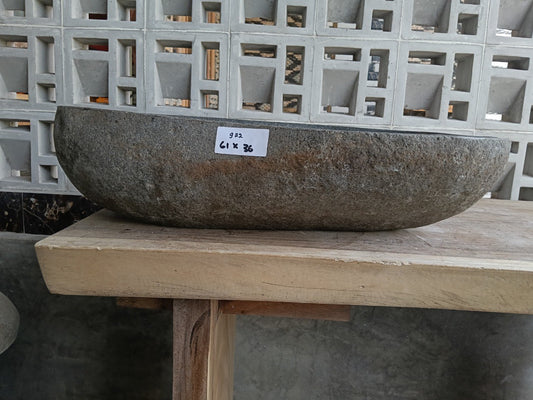 Front view of 6922-6136 river stone basin — polished interior