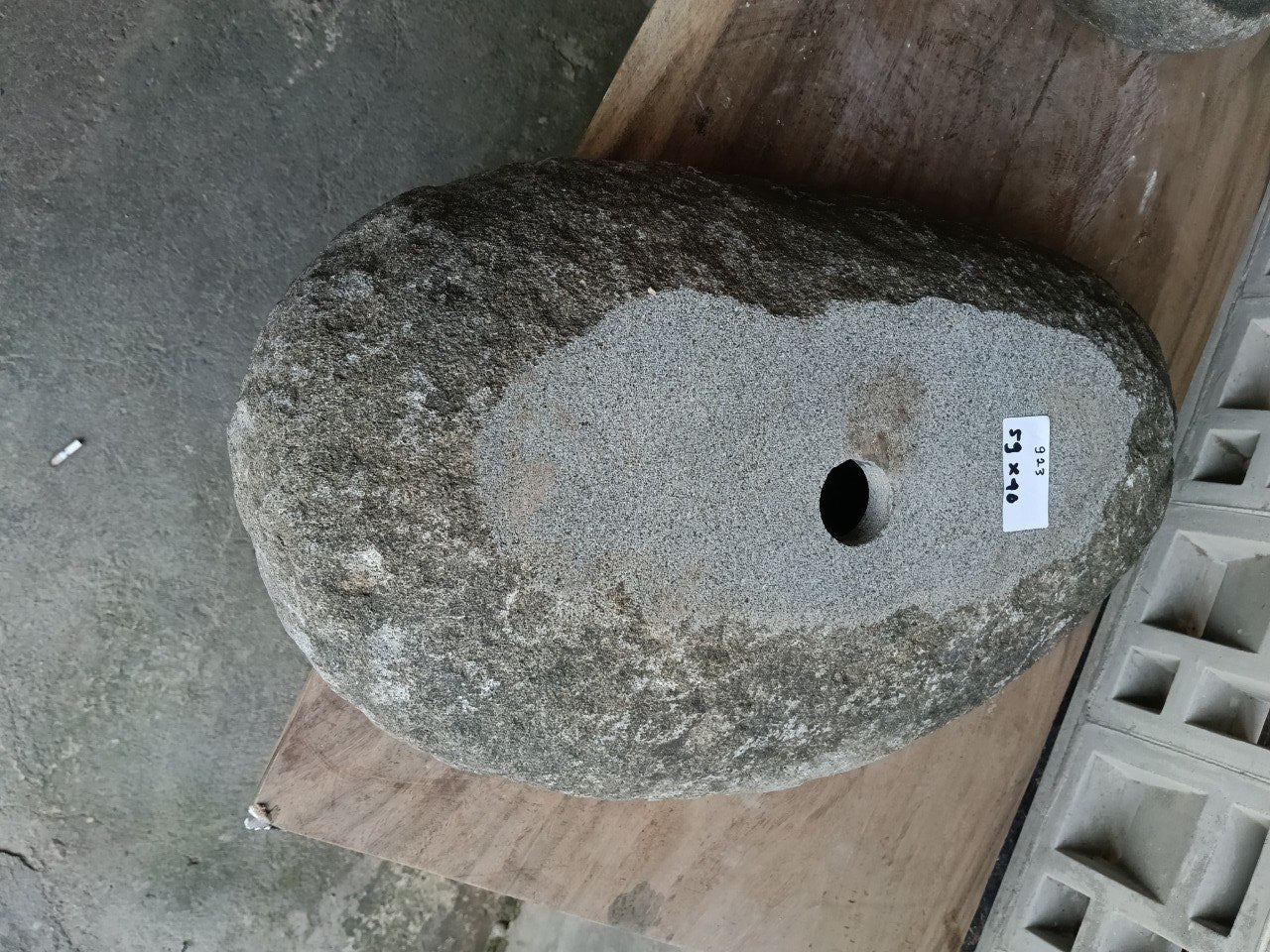 Bottom view of 6923-5940 solid river stone vessel