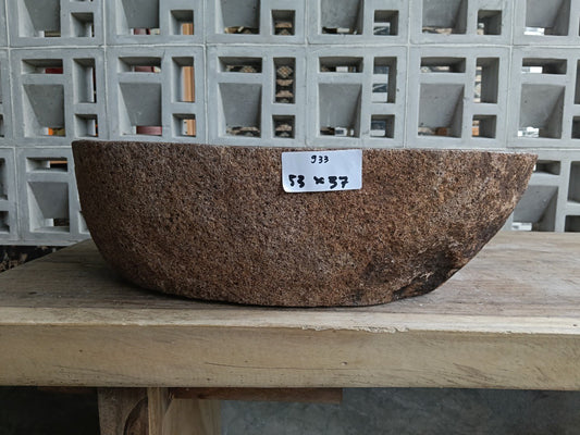 Front view of 6933-5337 river stone basin — polished interior