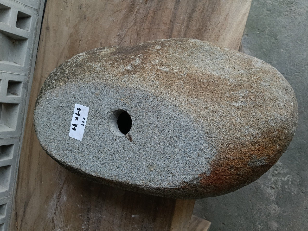 Bottom view of 6934-5434 solid river stone vessel