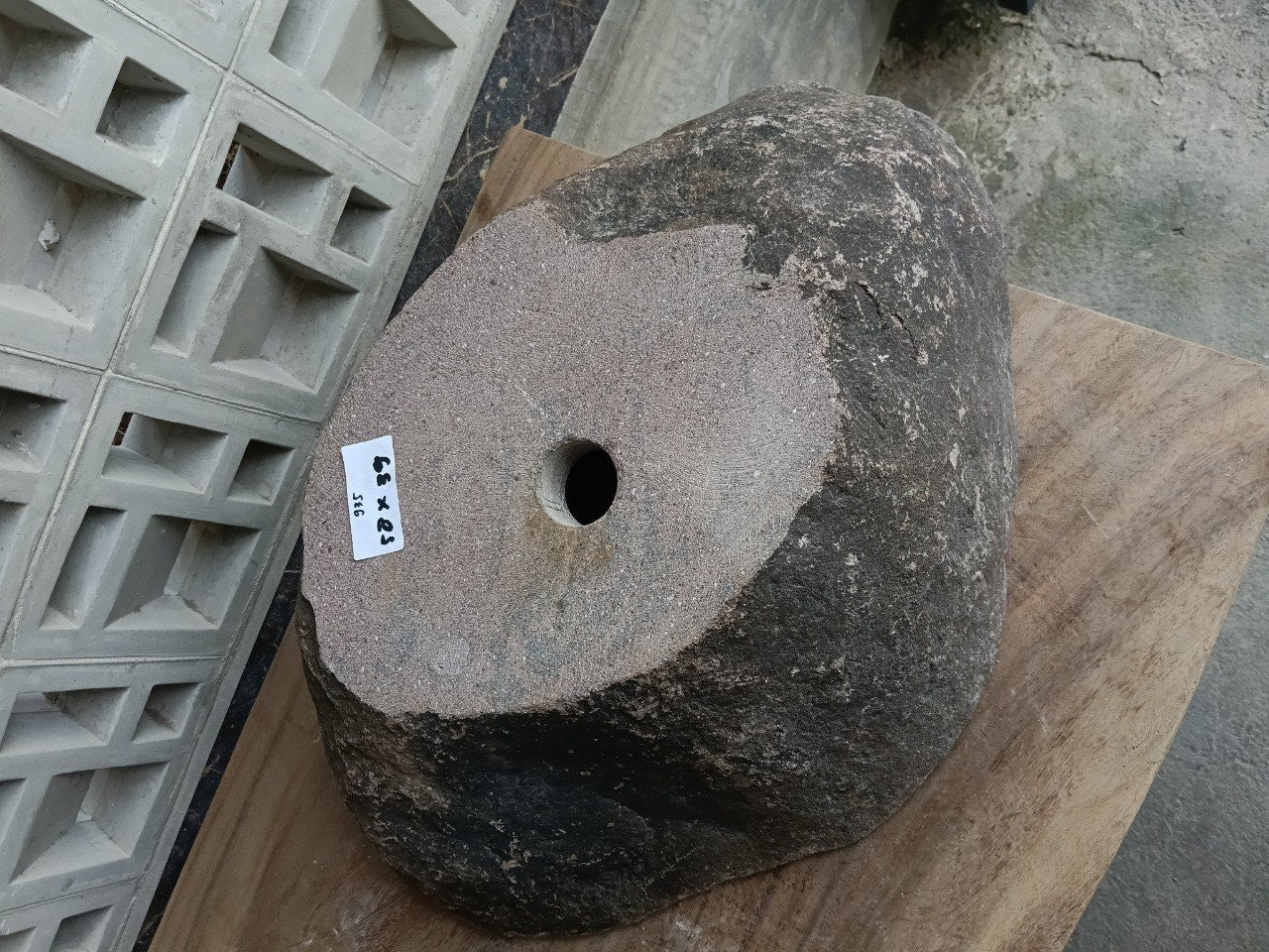 Bottom view of 6935-5839 solid river stone vessel