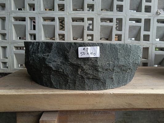 Front view of 60A9-5040 andesite stone vessel — polished interior bowl