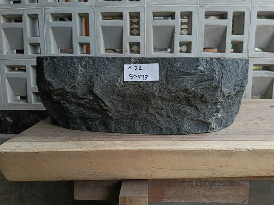 Front view of 6A22-5043 andesite stone vessel — polished interior bowl