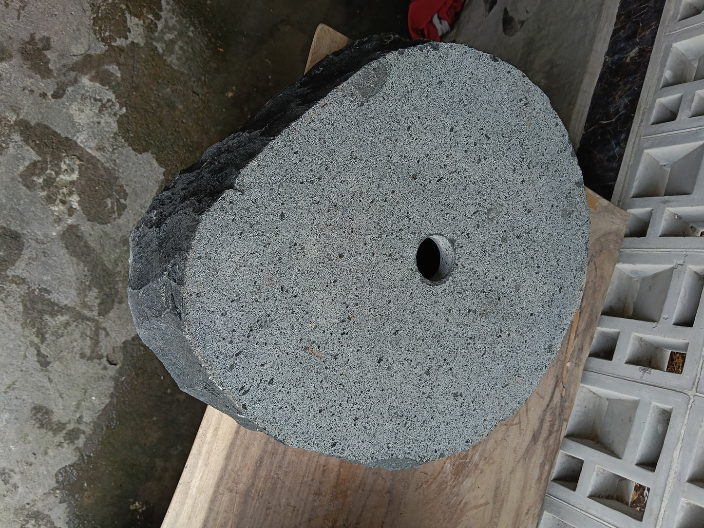 Bottom view of 6A22-5043 solid andesite stone sink — standard drain hole