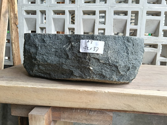 Front view of 60A3-4237 andesite vessel basin — polished interior and natural texture