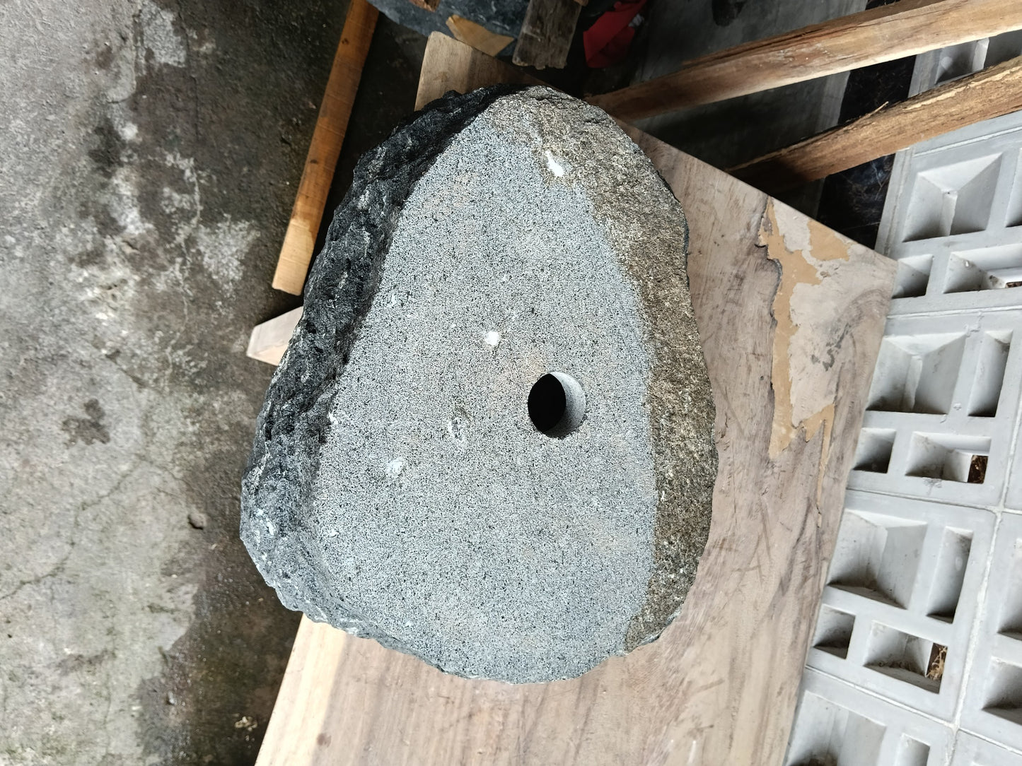 Bottom view of 60A3-4237 solid andesite stone sink — durable natural stone
