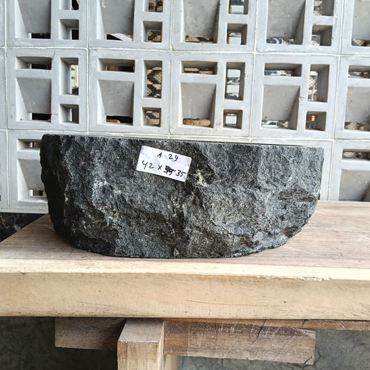 Front view of 6A29-4235 andesite stone vessel — polished interior bowl