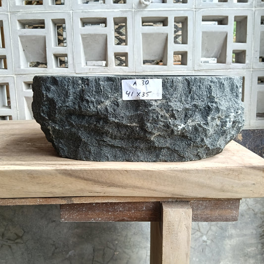 Front view of 6A30-4135 andesite stone vessel — polished interior bowl