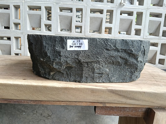 Front view of 6A39-4838 andesite stone vessel — polished interior bowl