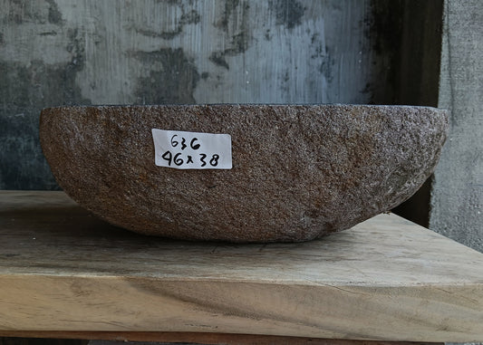 Front view of handcrafted dark brown oval river stone sink 6636-4638