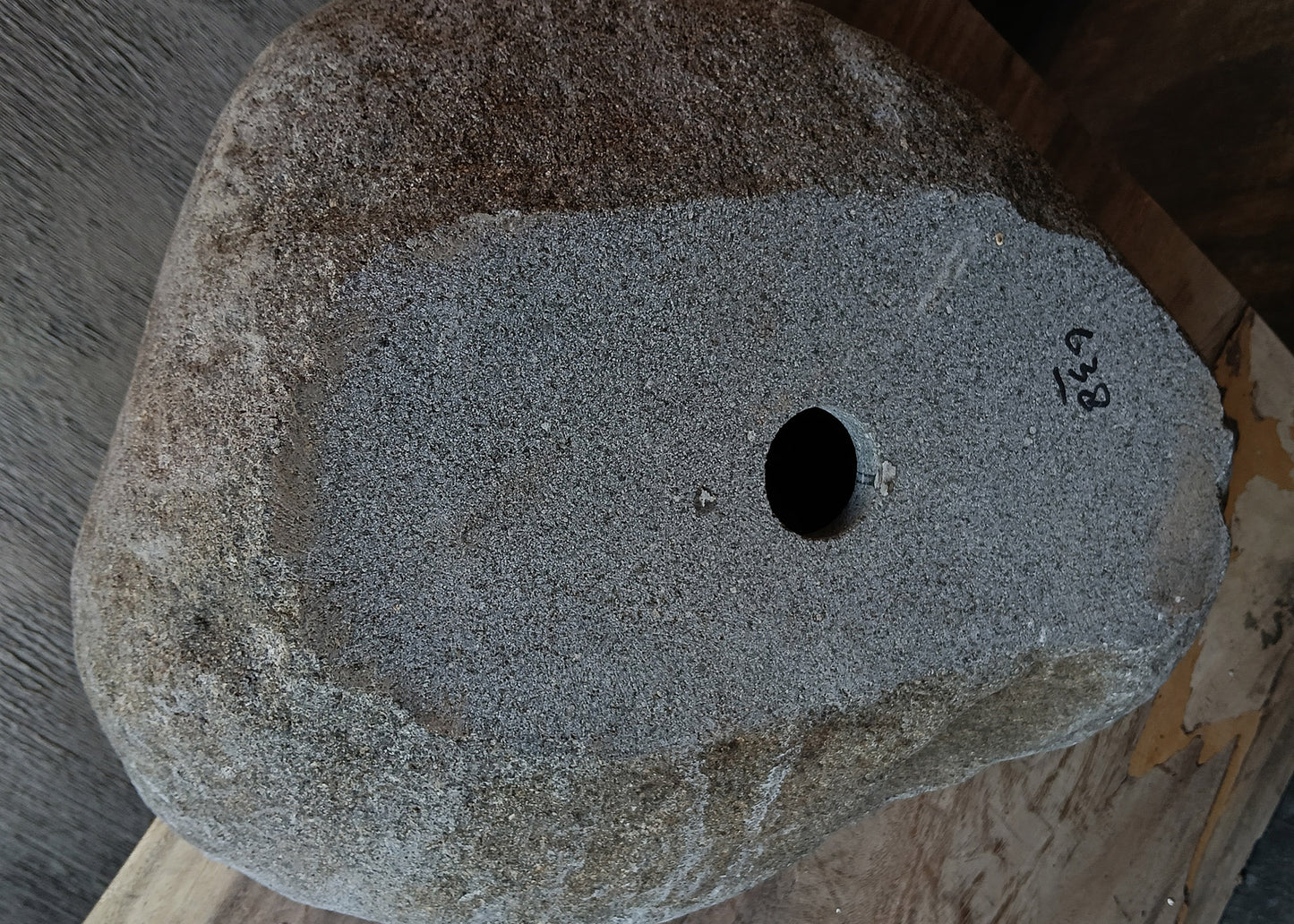 Bottom view of handcrafted rectangular dark gray river stone sink 6638-4437