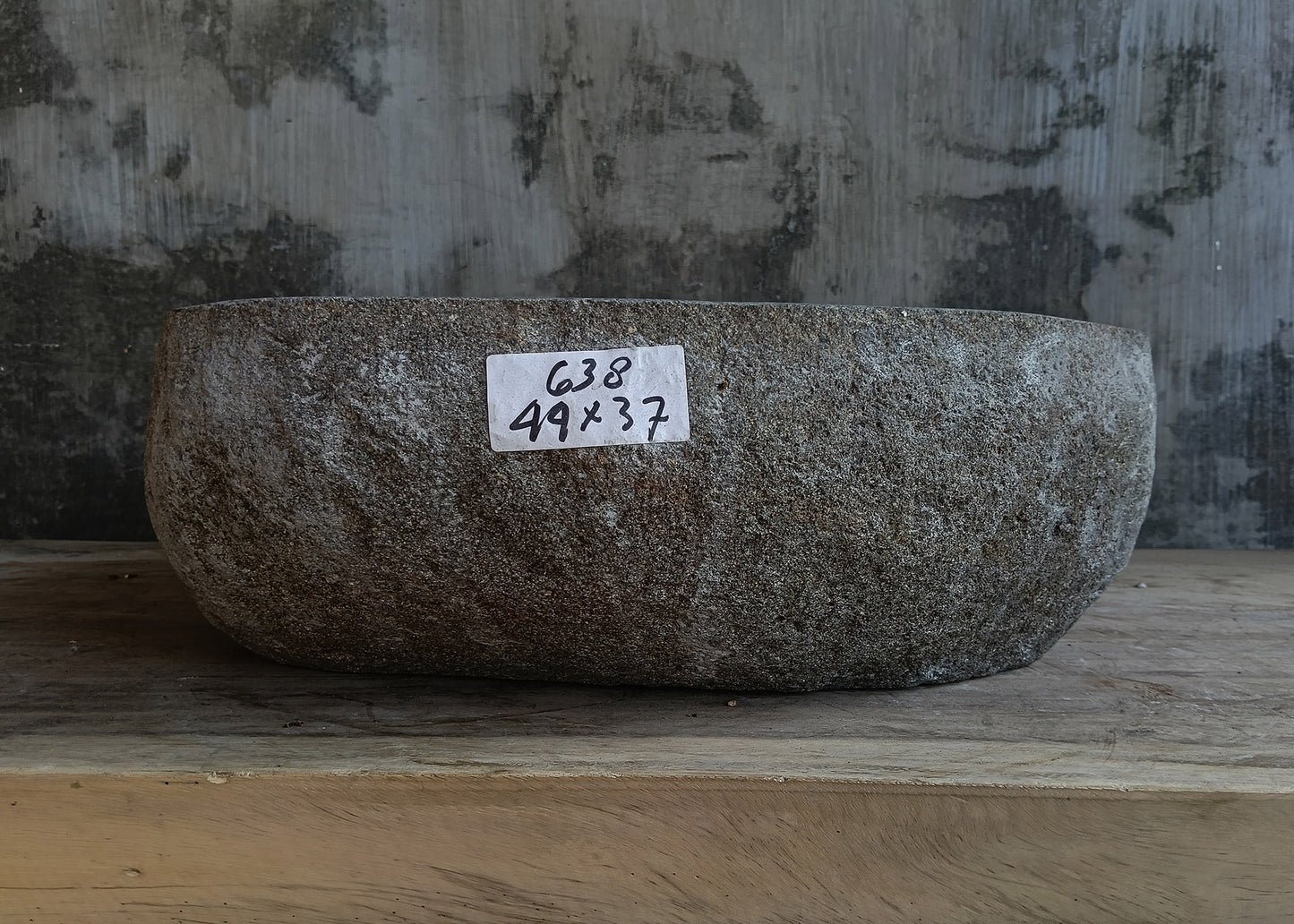Front view of handcrafted rectangular dark gray river stone sink 6638-4437