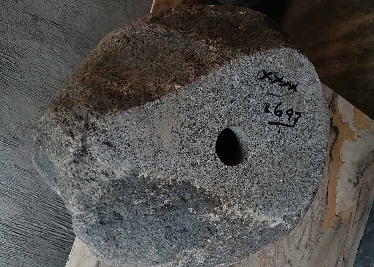 Bottom view of handcrafted round dark gray river stone sink 6647-3737