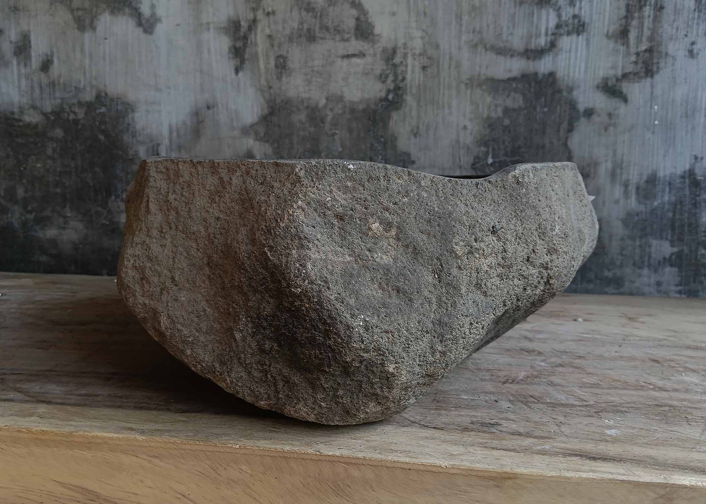 Right side view of round dark gray river stone vessel sink 6647-3737