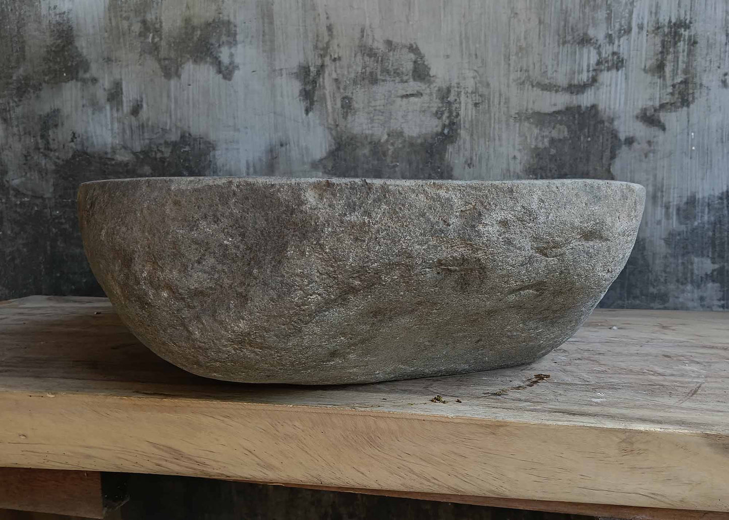 Right side view of oval dark gray river stone vessel sink 6648-5145