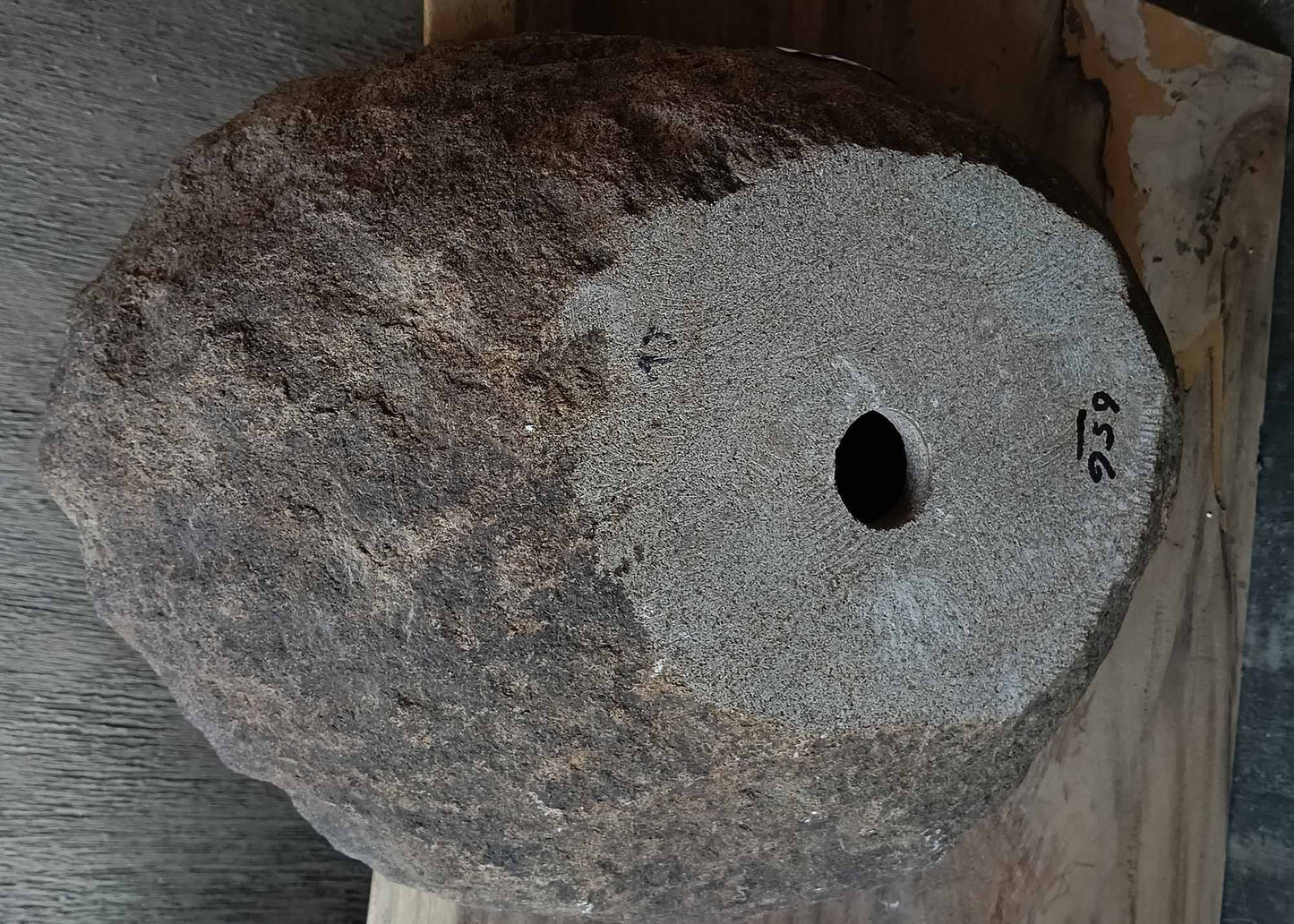 Bottom view of handcrafted oval light brown river stone sink 6656-5643