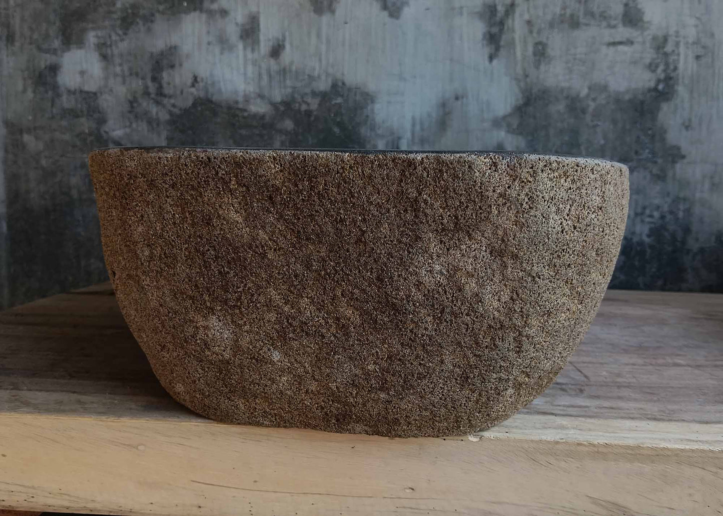 Right side view of oval dark gray river stone vessel sink 6667-4633