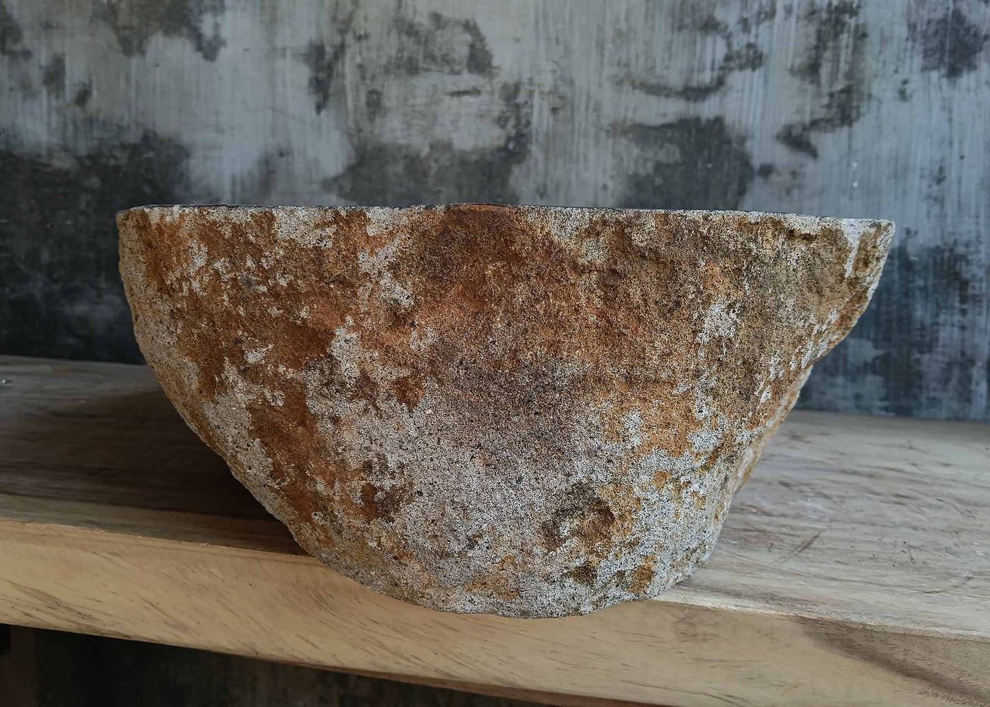 Right side view of polished oval river stone sink 6672-4939