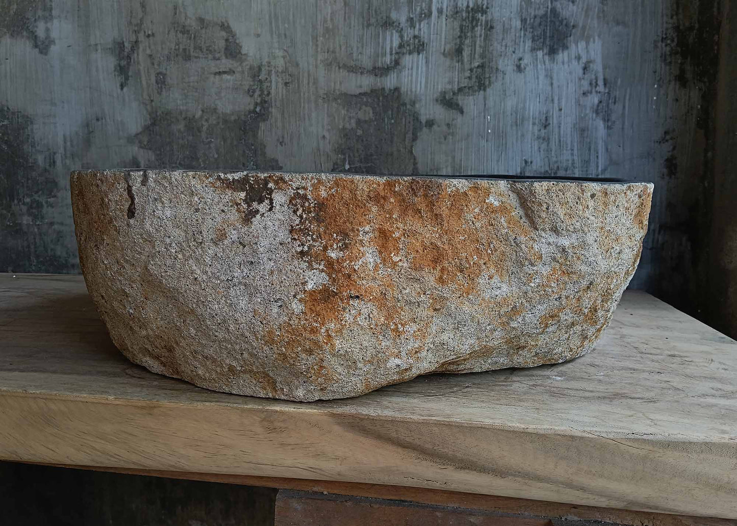 Back view of oval river stone sink 6672-4939 with natural stone surface