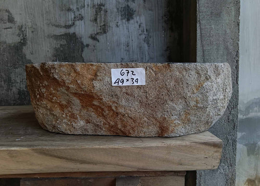 Front view of river stone sink 6672-4939 showing brown-gray rough exterior texture