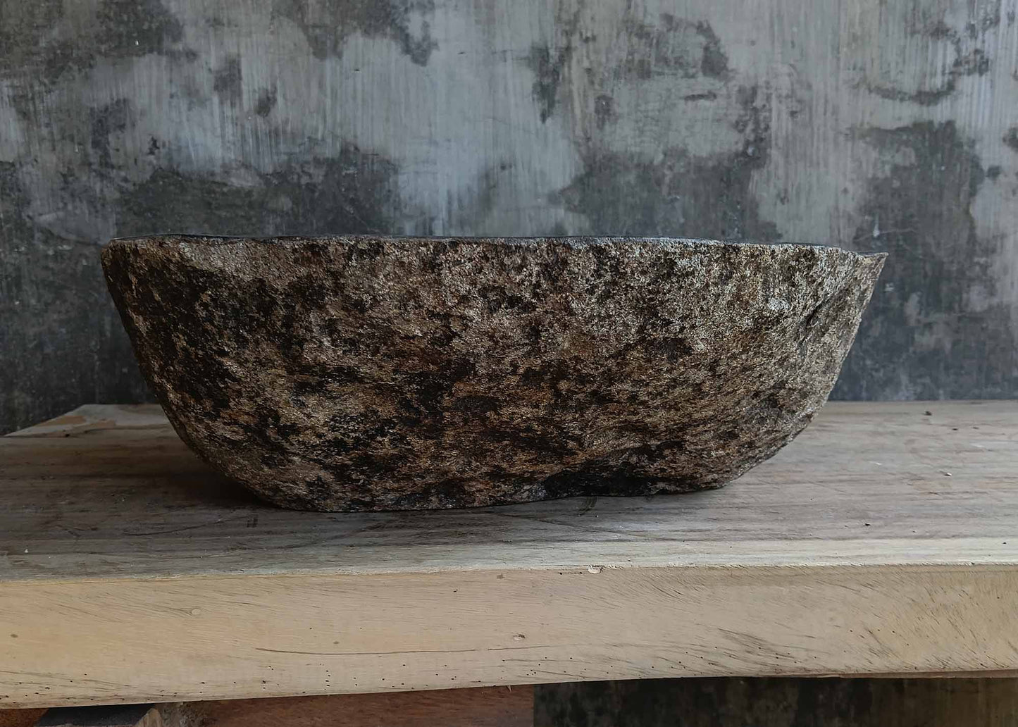 Back view of river stone sink 6673-1515 with natural brown-gray stone surface