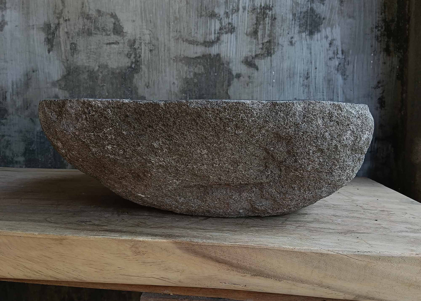 Right side view of handcrafted dark gray river stone sink 6674-4542