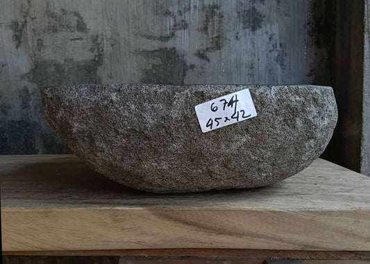 Front view of irregular dark gray river stone sink 6674-4542 showing textured exterior