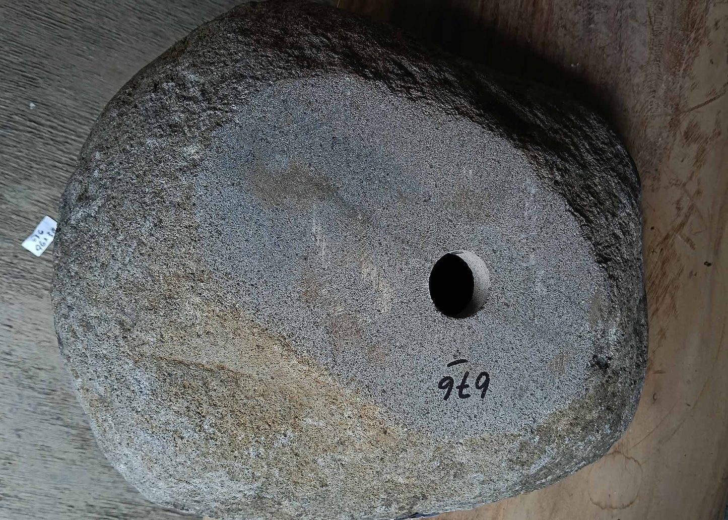 Right side view of handcrafted dark gray river stone sink 6676-5343 with rustic stone texture