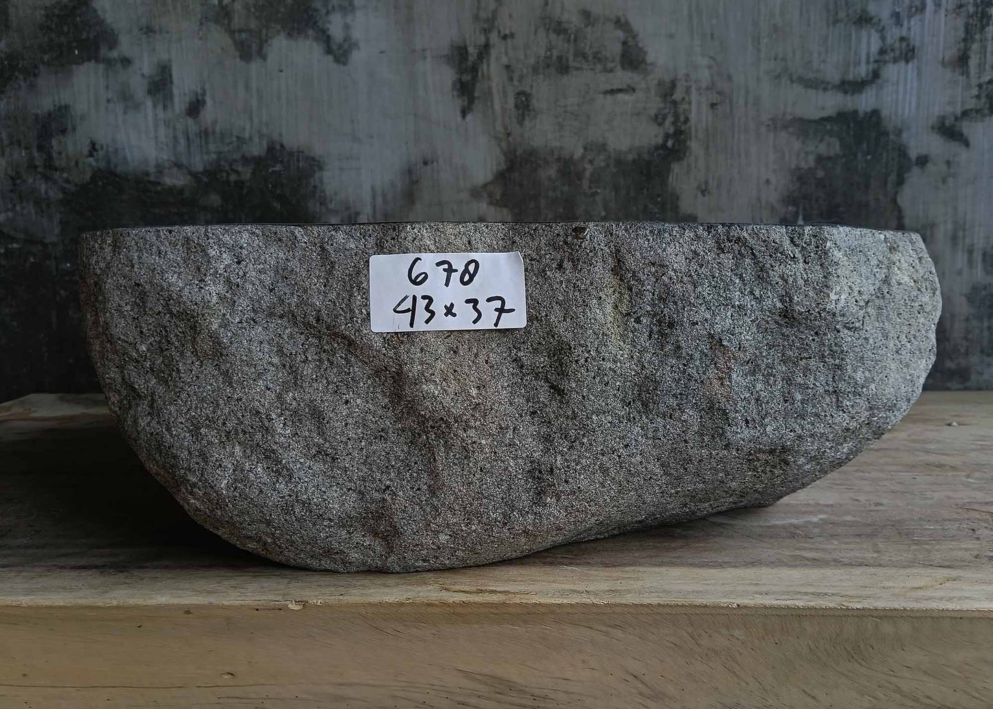 Front view of handcrafted dark gray river stone sink 6678-4337 with natural rough exterior