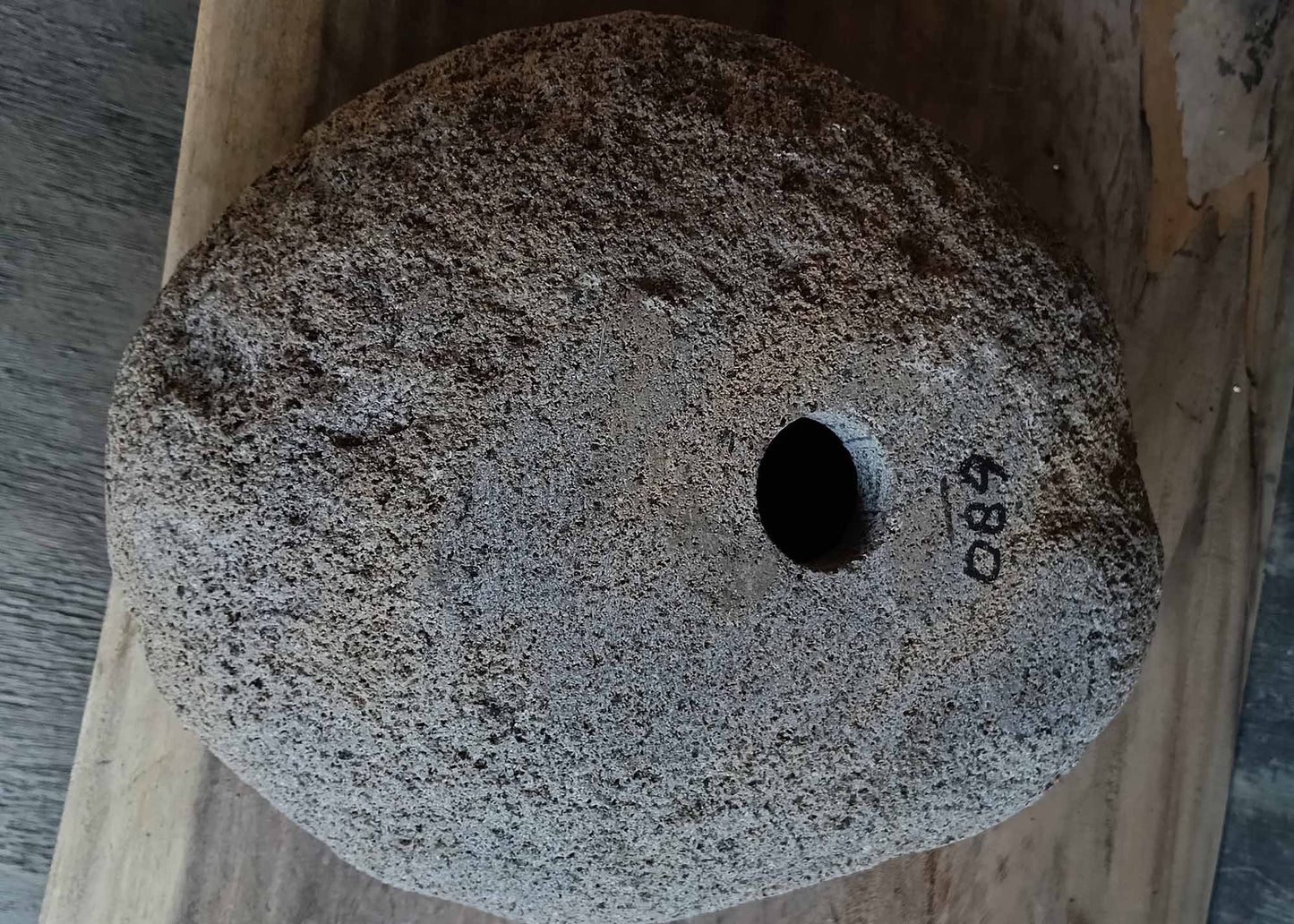 Bottom view of handcrafted light brown river stone sink 6680-3731 showing raw stone base