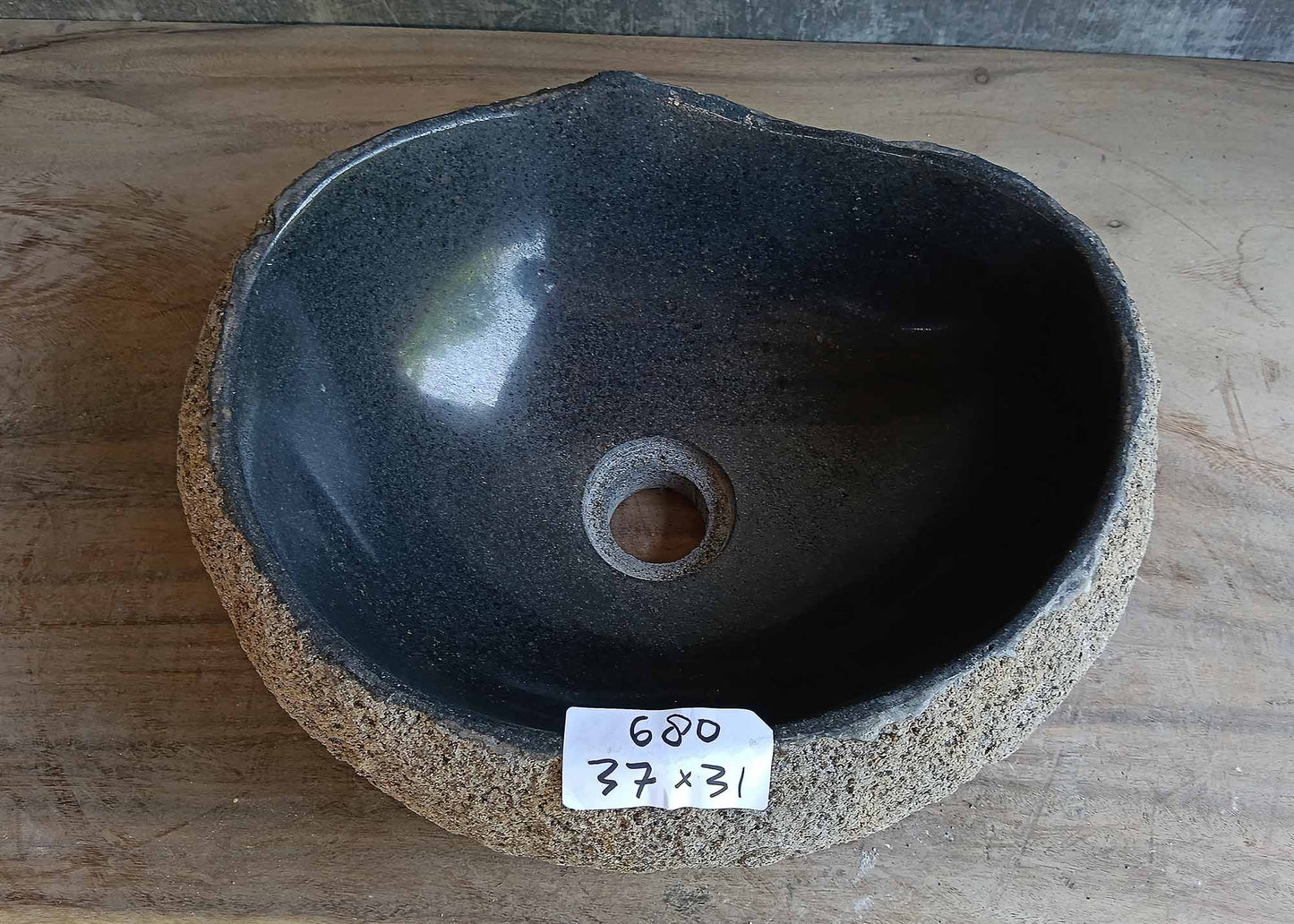 Top view of handcrafted light brown river stone sink 6680-3731 with polished interior