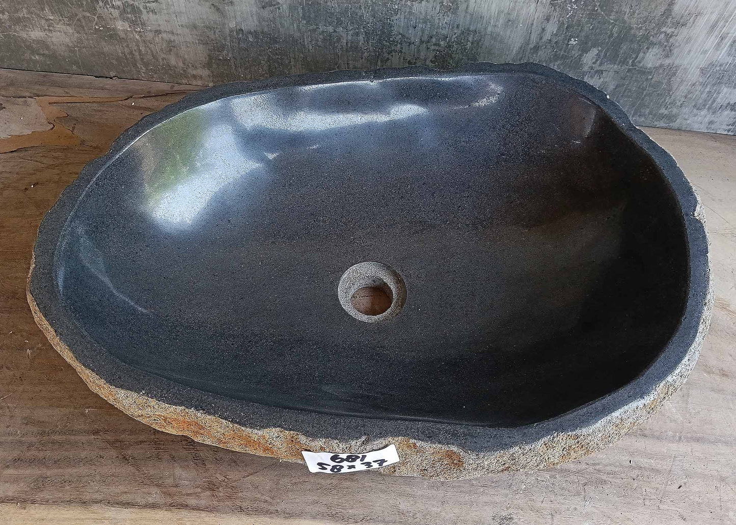 Top view of handcrafted brown-gray river stone sink 6681-5837 with polished interior