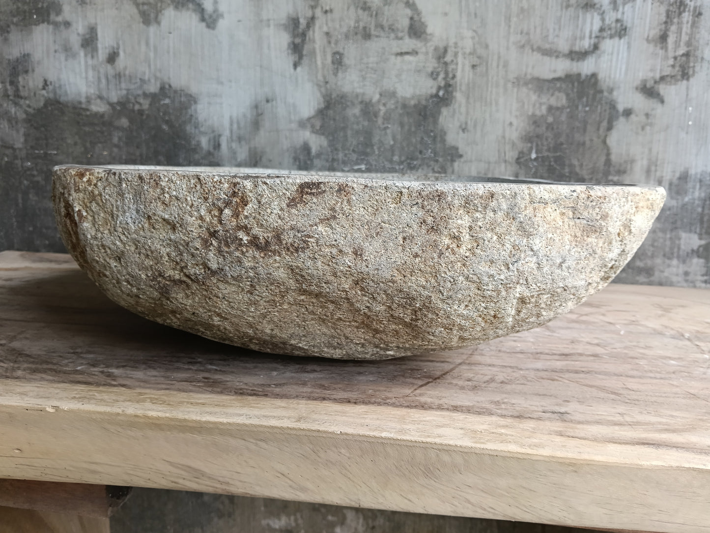 Left profile of sink 6131-4846 highlighting raw stone shell and organic shape