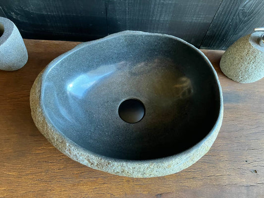 Oval river stone vessel sink RSC-078 with a natural textured exterior