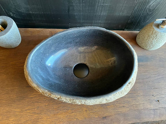 Top view of dark river stone sink RSC-081 showing its even, egg-shaped oval basin