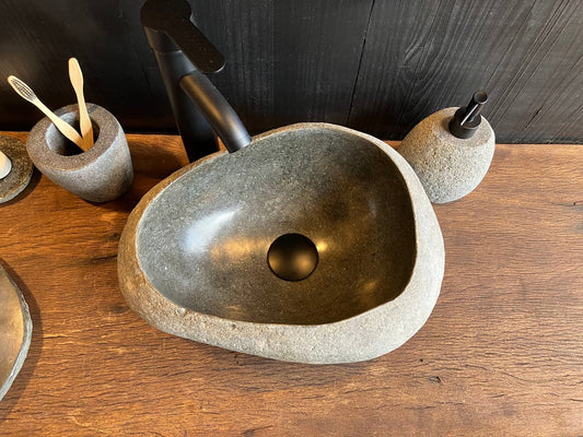 Top view of river stone sink RSC-087 showing its dark interior basin