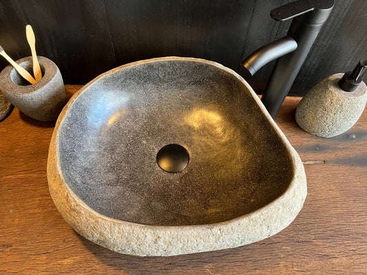 Top view of river stone sink RSC-088 showing its black interior basin