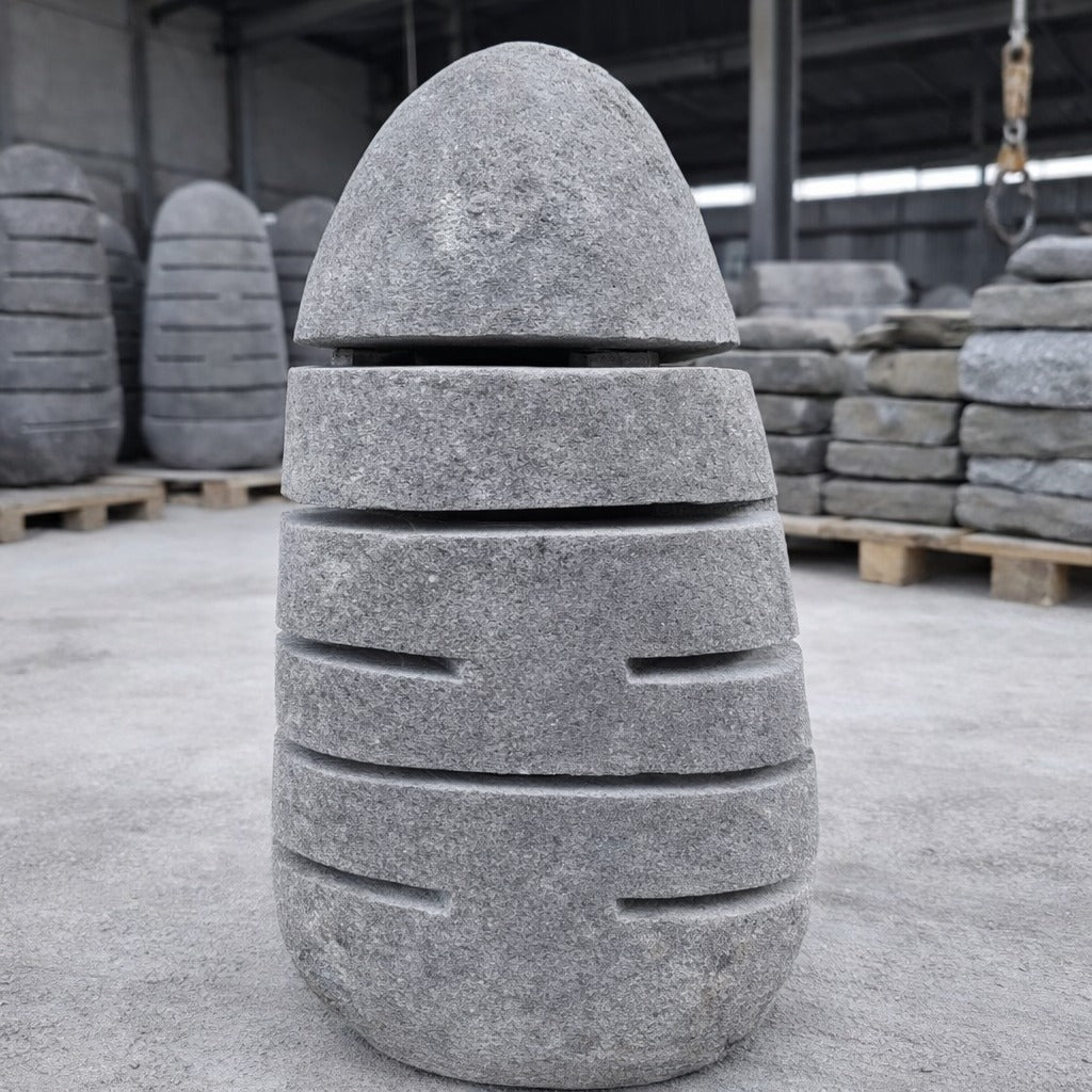 Handcrafted riverstone garden lantern made from solid natural stone, outdoor decorative stone lighting