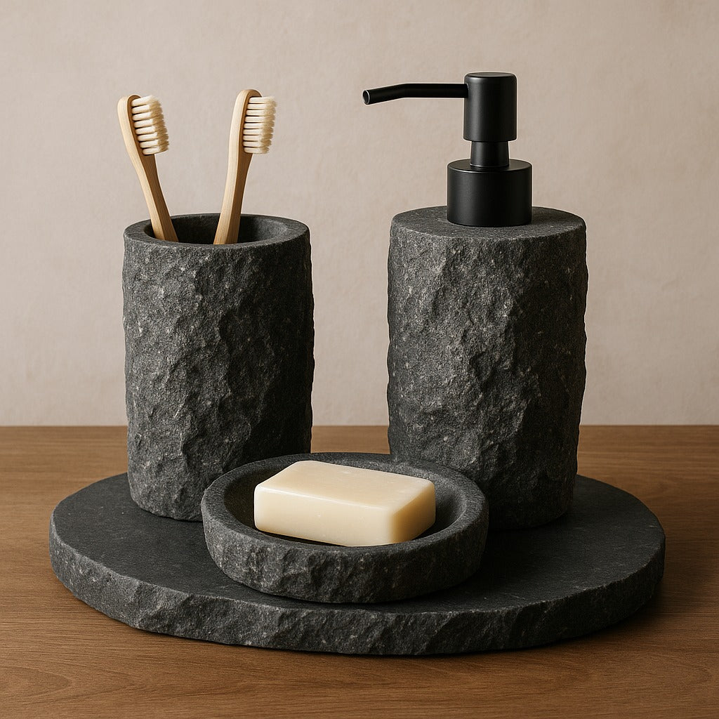 Andesite stone bathroom set with soap dispenser, toothbrush holder, and soap dish on a natural stone tray.