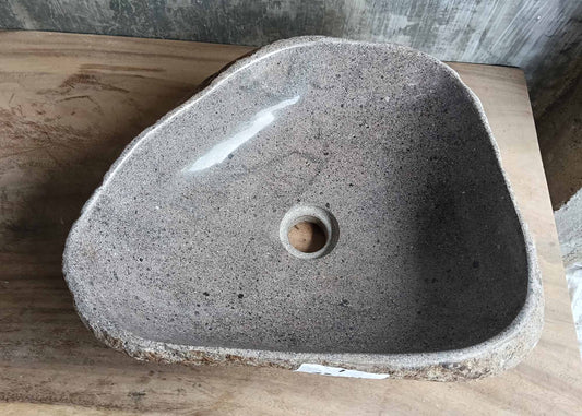 Top view of triangular river stone sink 6001-4535 with polished light gray interior
