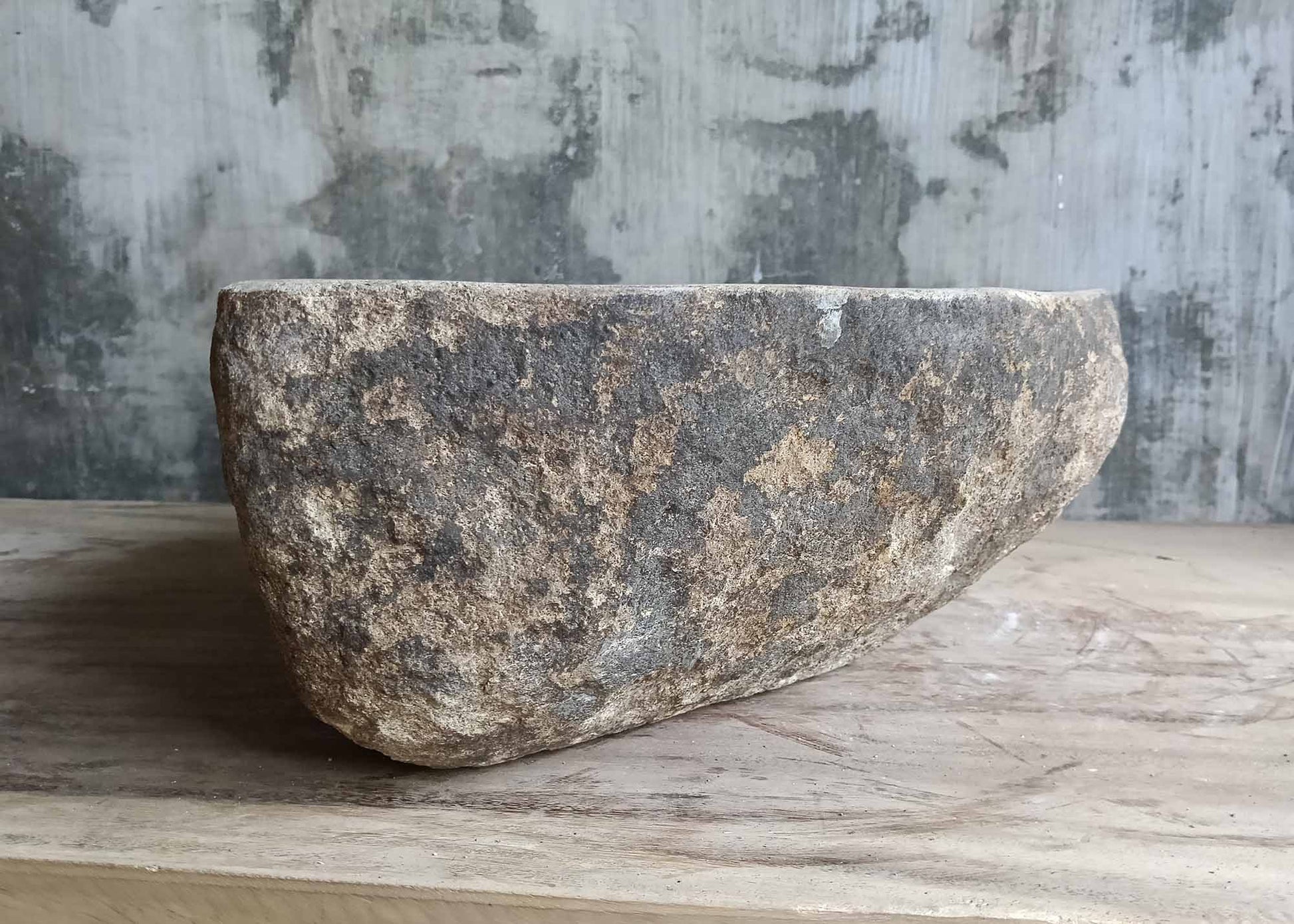 Left angle of river stone sink showing smooth interior curve – 6005-3934
