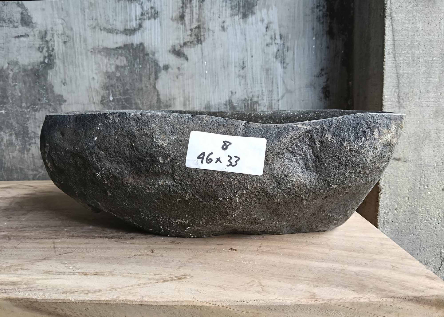 Front view of handcrafted river stone sink 6008-4633 with smooth glossy surface
