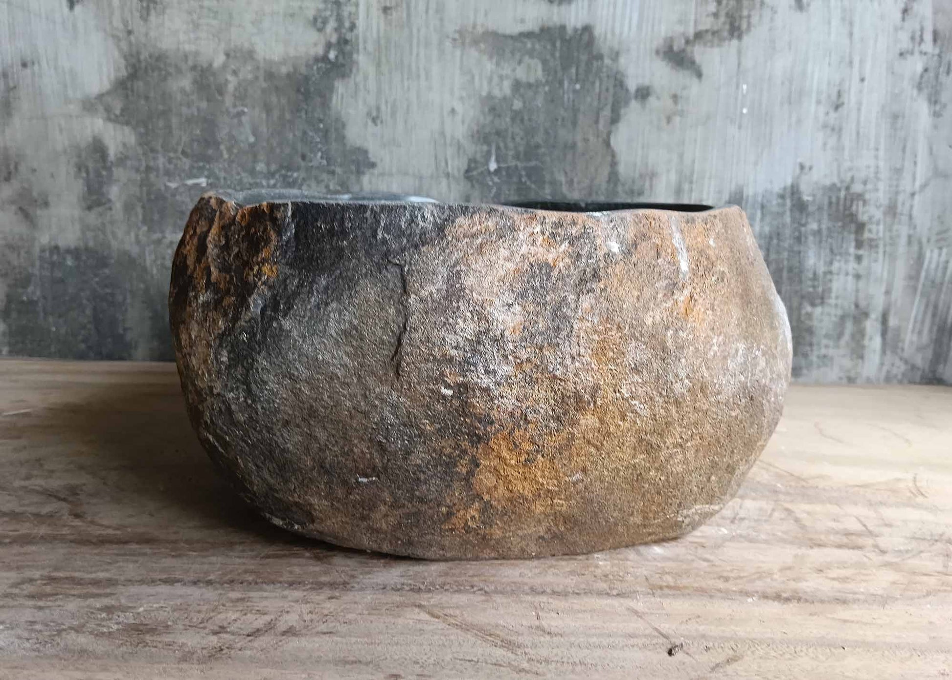 Back side of organic black river stone basin with rough surface – 6014-3430
