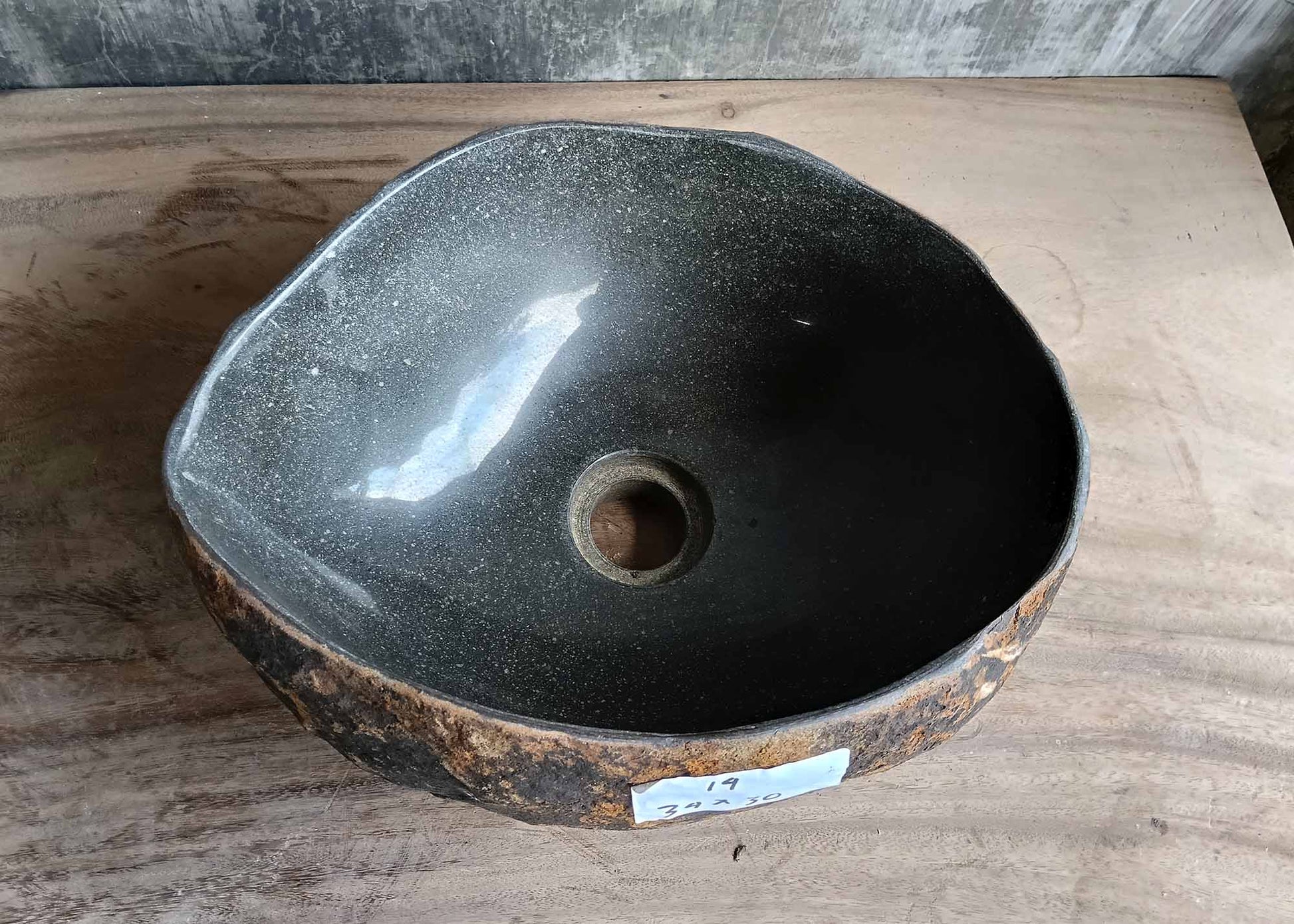 Top view of black polished river stone sink with organic shape – 6014-3430
