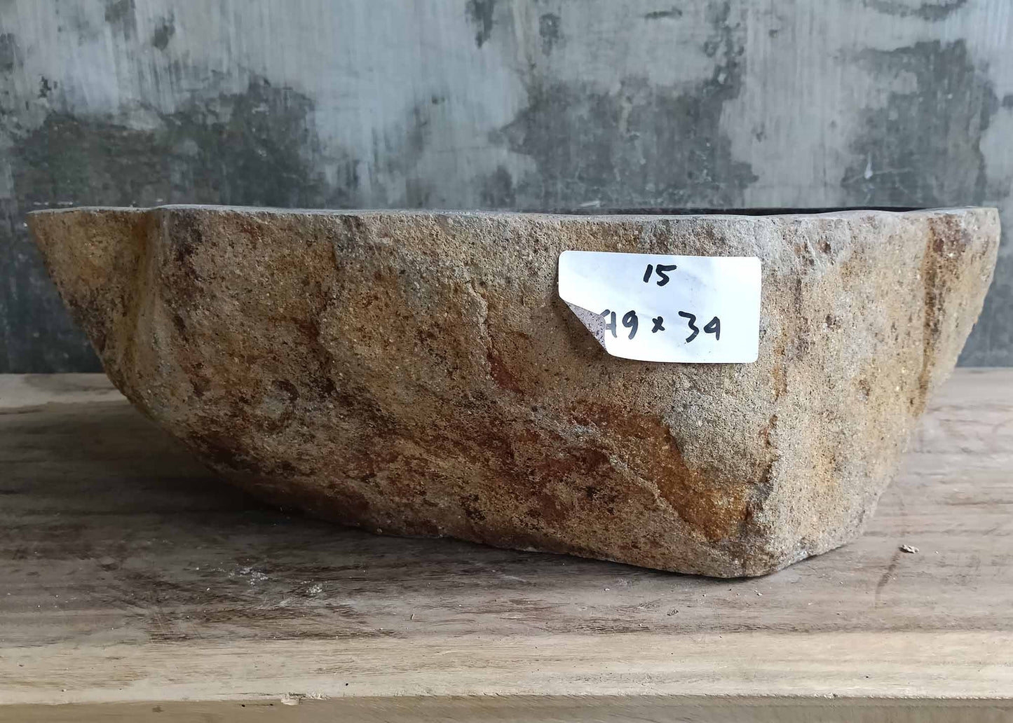 Front view of handcrafted stone sink 6015-4934 showing natural textured rim
