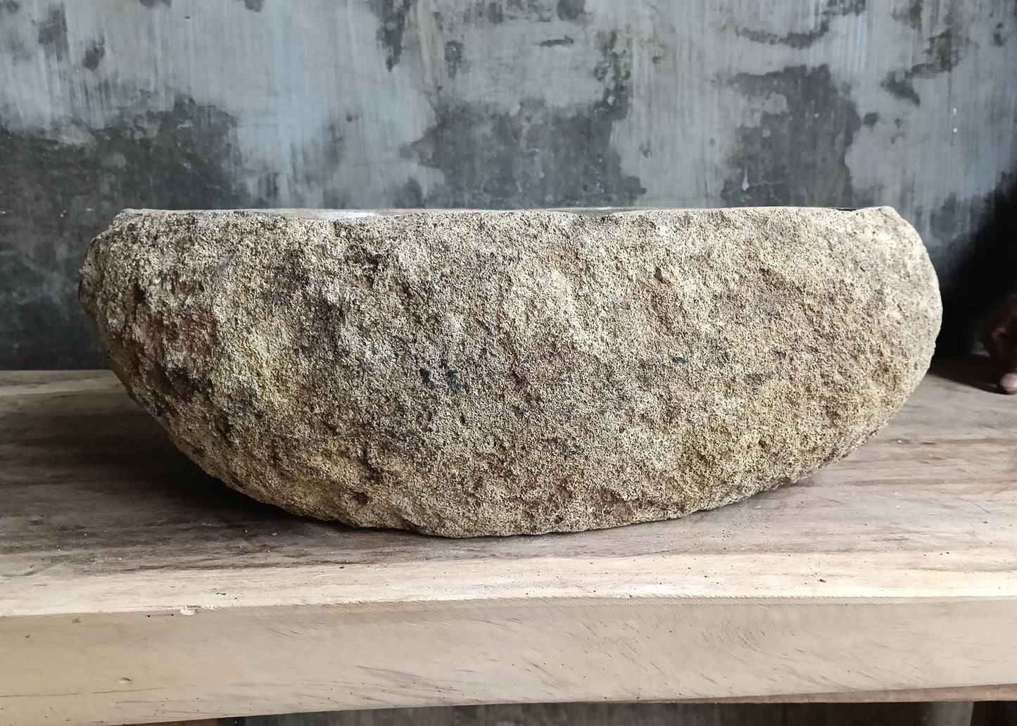 Backside of stone sink 6016-4733 with raw natural beige stone exterior

