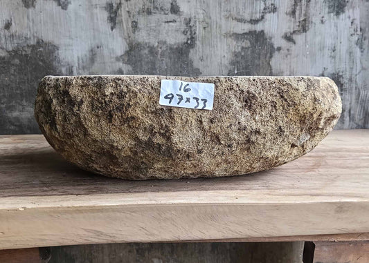 Front view of handcrafted river stone sink 6016-4733 showing rough outer texture

